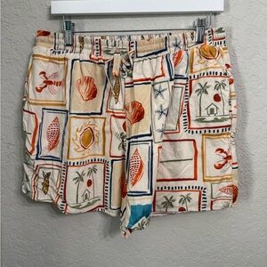 Petal & Pup Cream Shorts with Orange & Blue Beach Motif